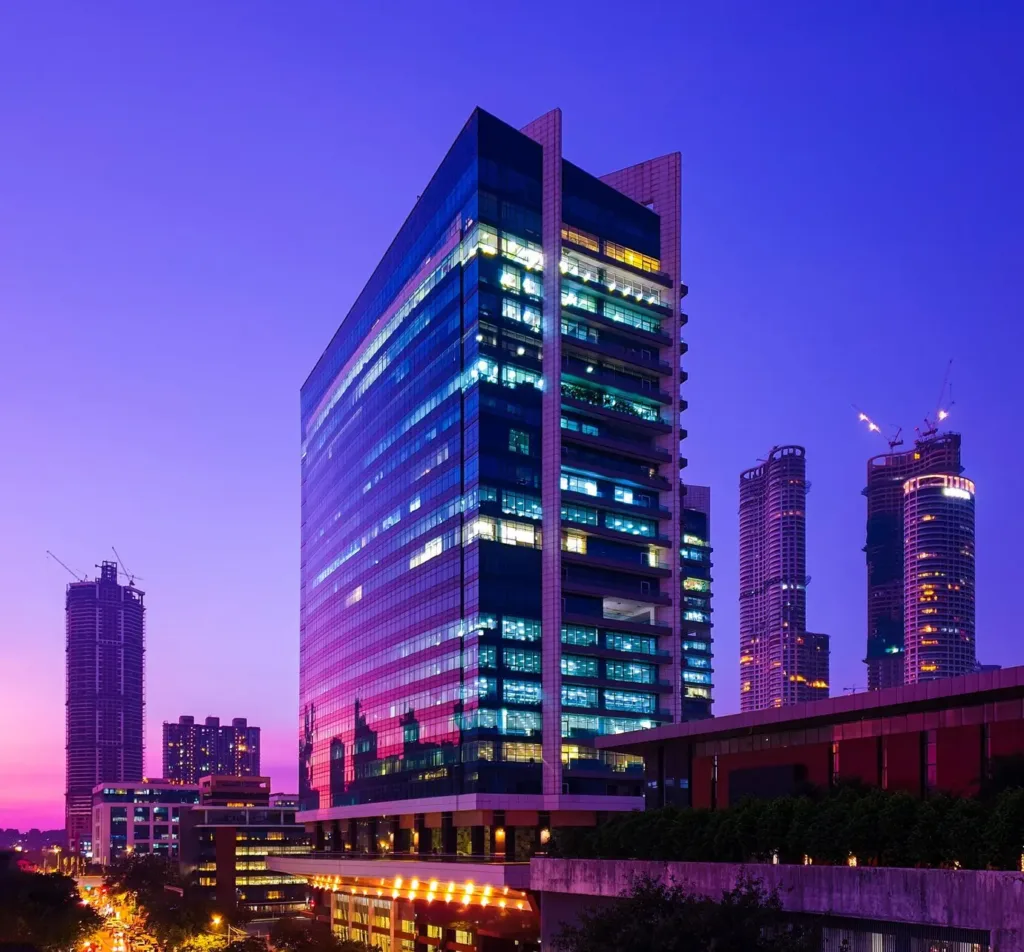 Glassclad skyscrapers of central mumbai reflecting the sunset hues at the blue hour
